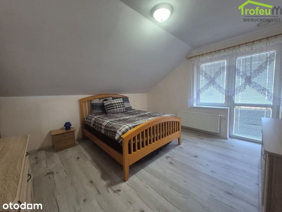Komfortowy dom z dużym tarasem i 2 garażami