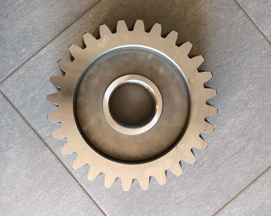 Koło Z28 przekładni napędu rotora przyczepy samozbierającej STRAUTMANN