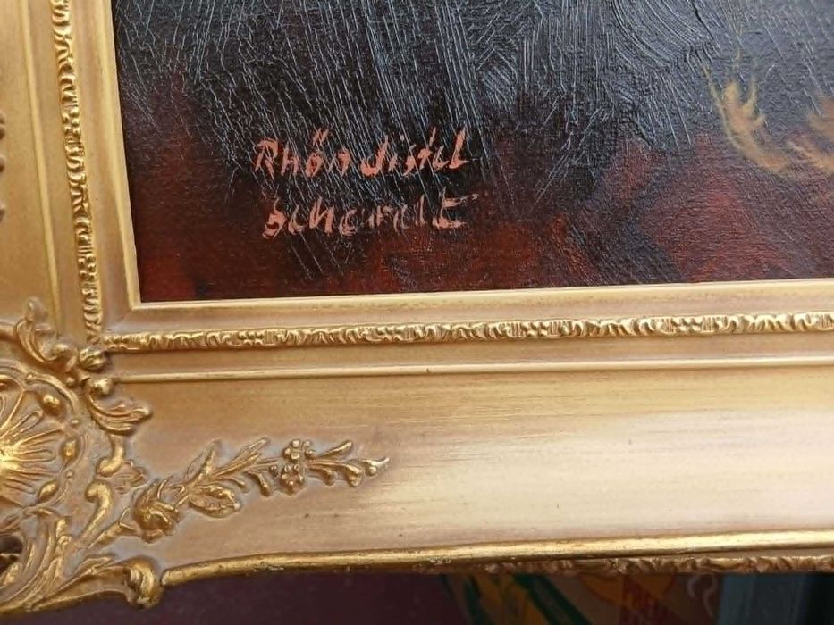 Obraz w złotej ramie