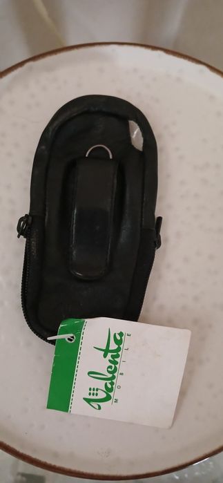 Кожаный чехол новый две змейки сбоку  для хранения мелких деталей