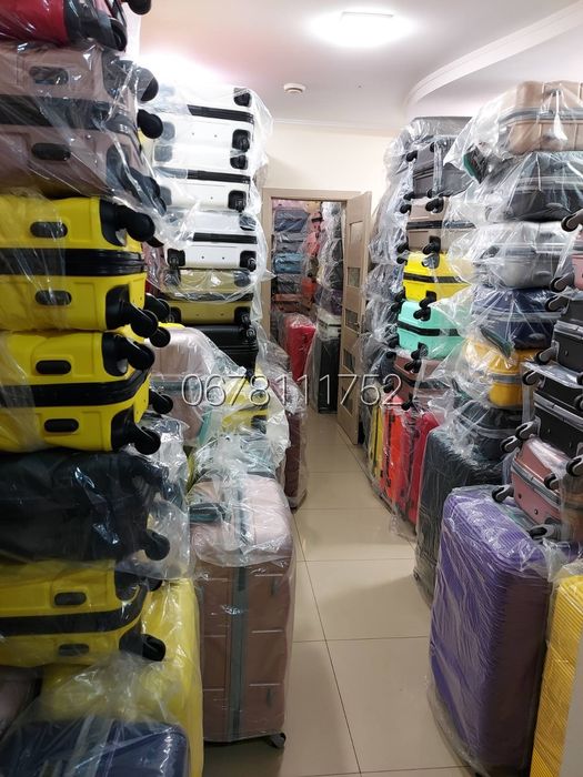 МАГАЗИН - СКЛАД валізи чемоданы сумки на колесах ручна поклажа рюкзаки