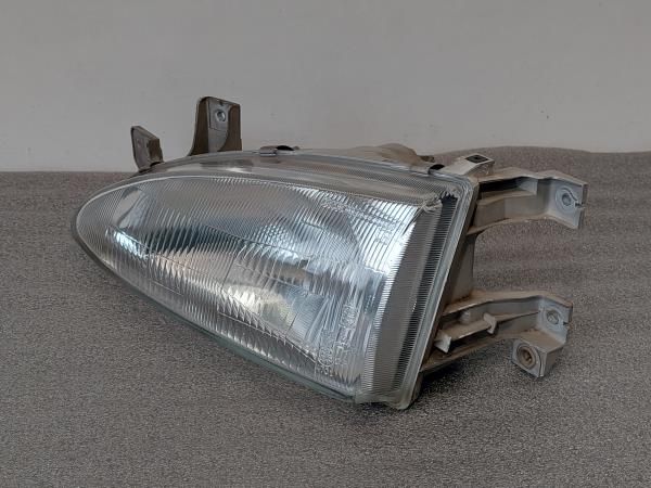 Ótica / farol esquerda HYUNDAI Accent I Sedan (X3)