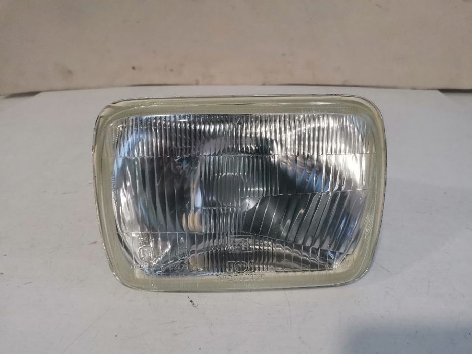 farol optica nissan patrol / mitsubishi L200 L300/toyota hilux /jeep cherokee (novo)