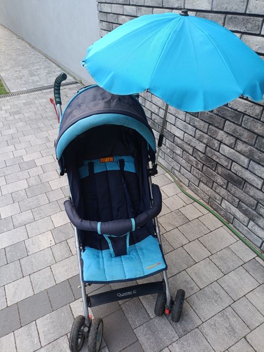 Wózek spacerowy z parasolką i folią przeciwdeszczową