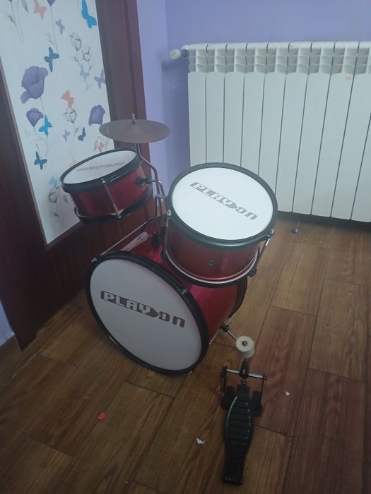 Bateria infantil como nova
