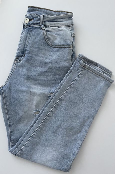 Spodnie damskie jeansowe denim z przetarciami wysoki stan rurki M