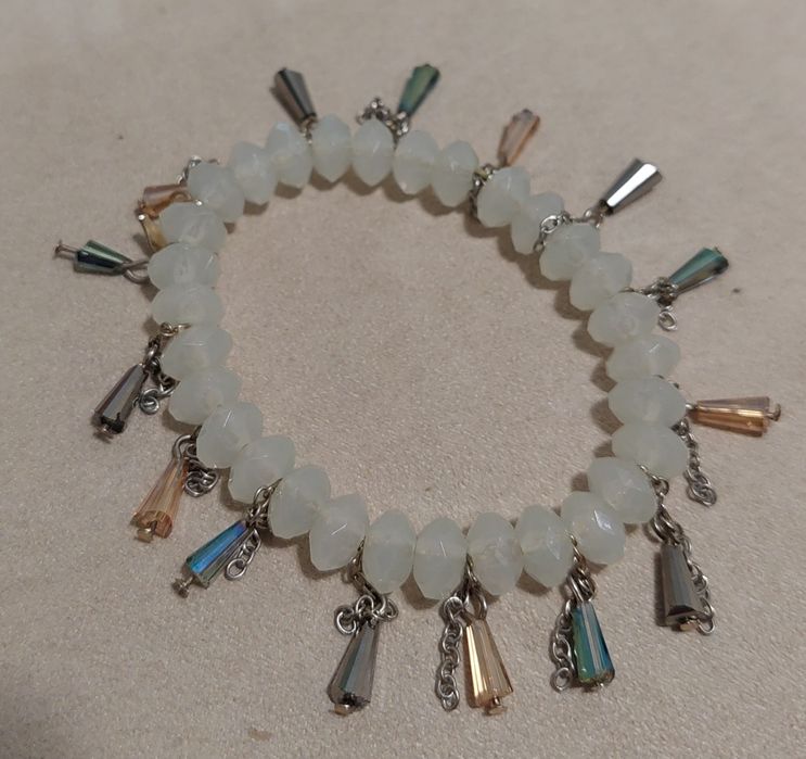 Pulseiras em prata, rodio e aço dourado