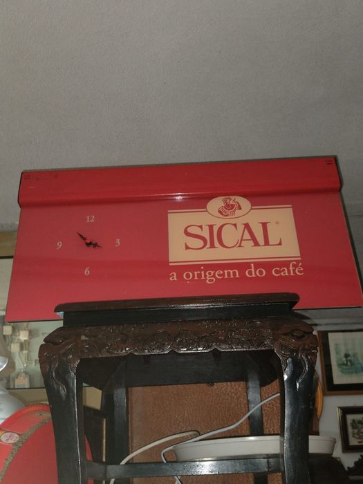 Letreiro e relógio SICAL