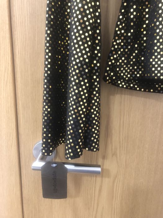 Blusa dourada de brilho