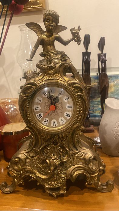 Relógio decorativo em bronze