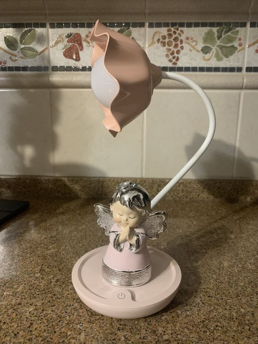 Candeeiro maleável com anjo