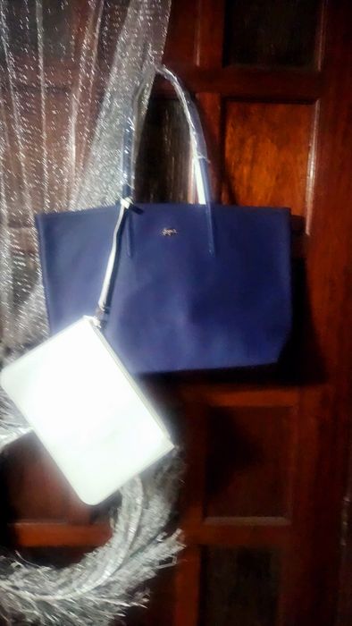 Bolsas lacoste a 60% novas com saco de embrulho