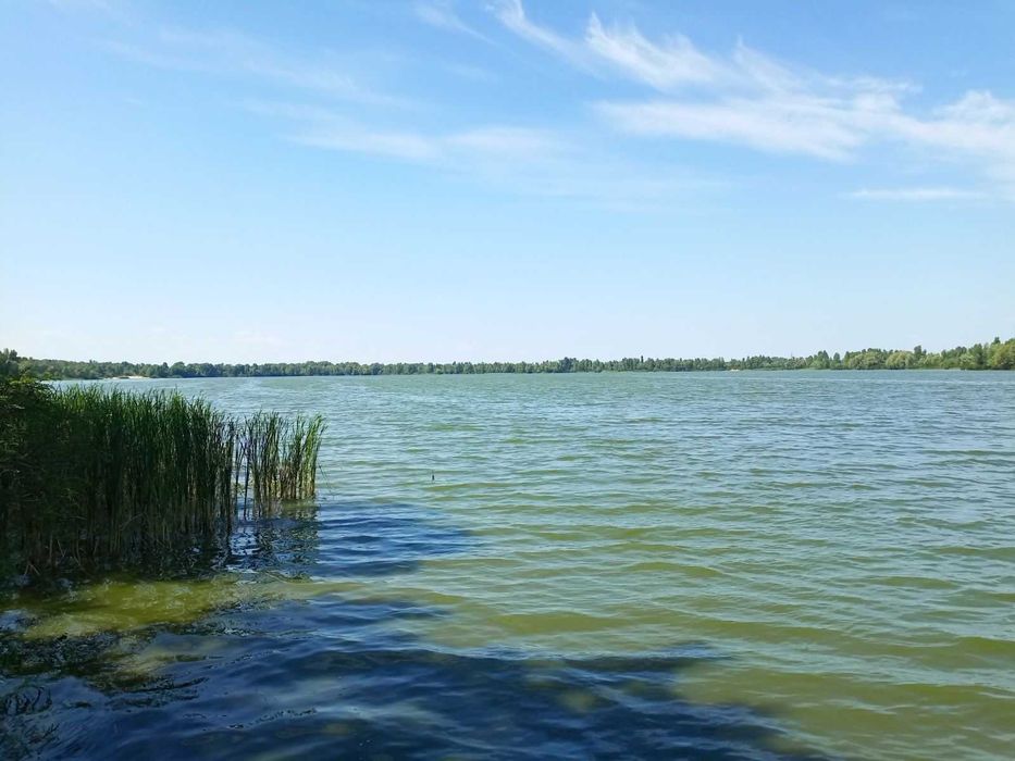 Продаж ділянки під забудову перша лінія від водойми на Троєщині без%