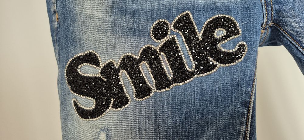 Spodnie damskie jeans z naszywkami S 36