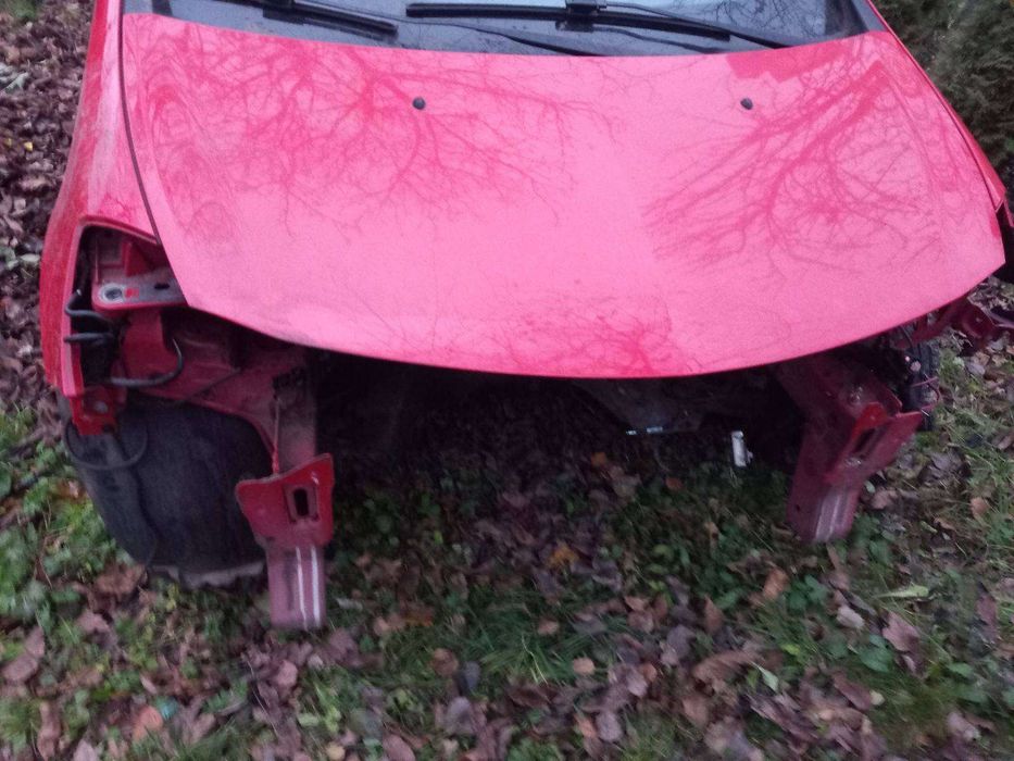 Maska Clio 3 , błotnik czerwony, stan bd. Kod 0V727