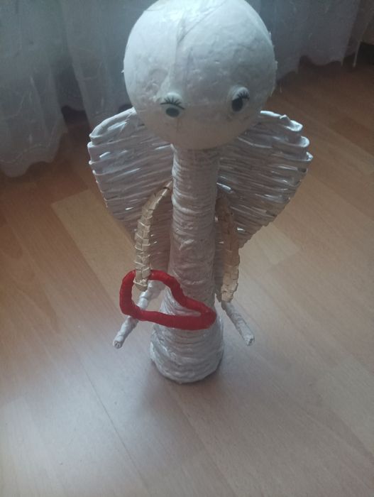 Lalka papierowa i czapka