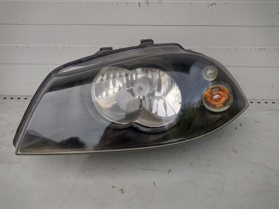 Swat Ibiza 6L Cordoba 02-08 - Reflektor lewy kpl. H4 Oryginał EUR.