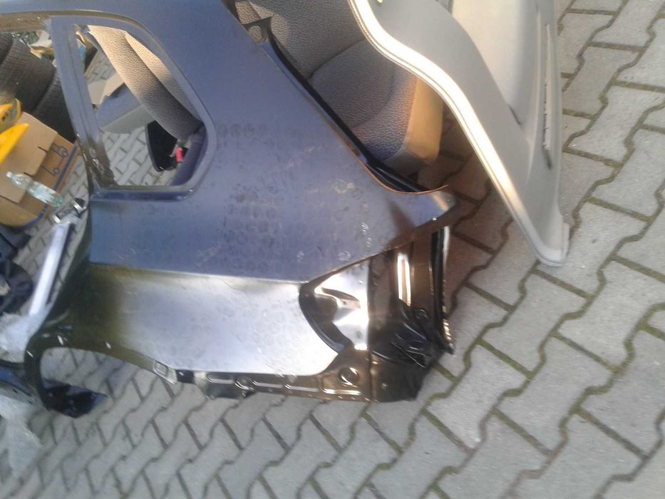 Nowy Błotnik Poszycie Błotnika Orginal BMW X5 E70 Lewy Tył Lewe Ćwiara