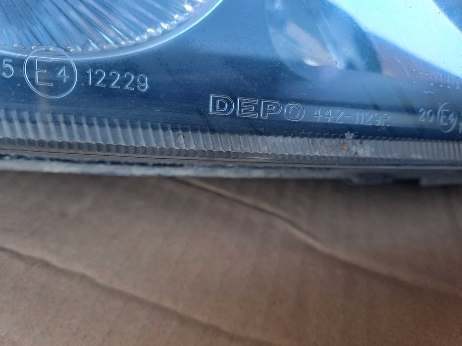 Lampy przód Opel Vectra c