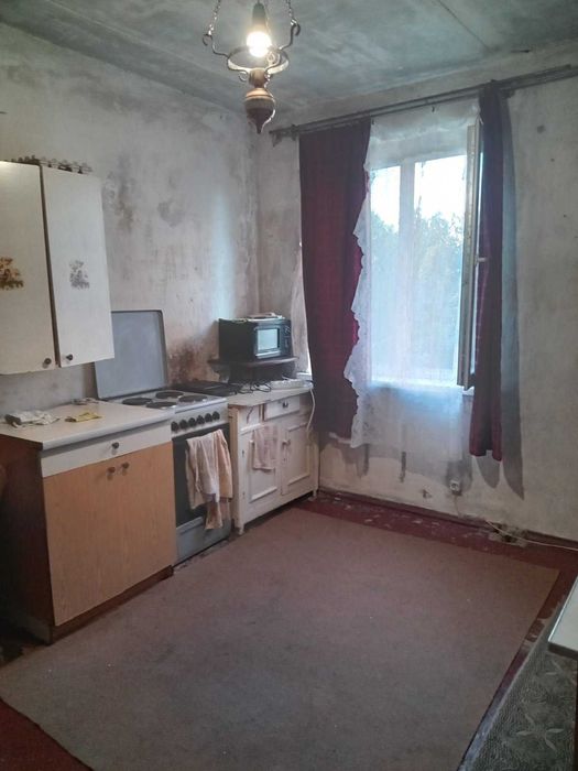 Продам 4-х комнатную квартиру в центре