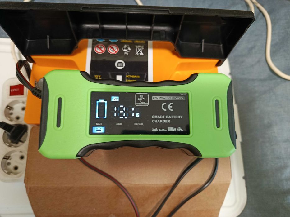 Зарядное устройство для авто аккумулятора 600 гривен зеленое
