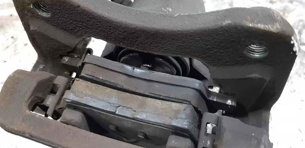 PINÇA TRAVÃO TRASEIRA ESQUERDA KIA CARENS IV 2018 -58310A4B10