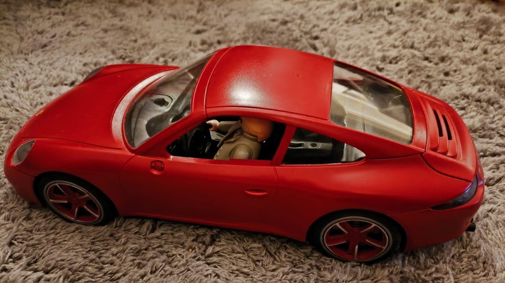 Porshe Playmobil em ótimo estado com 2 bonecos