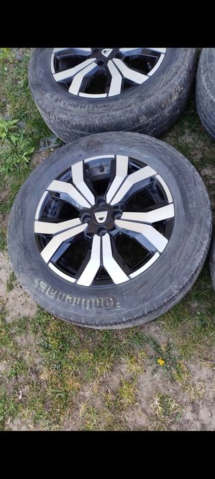 Alufelgi z oponami 16 i  Mata do bagażnika Dacia Jogger