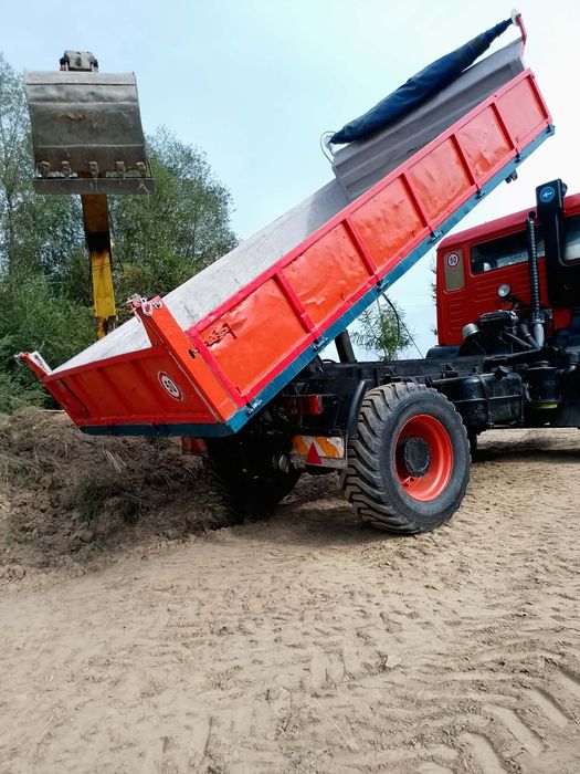 Usługi koparko-ładowarką+wywrotka  4×4