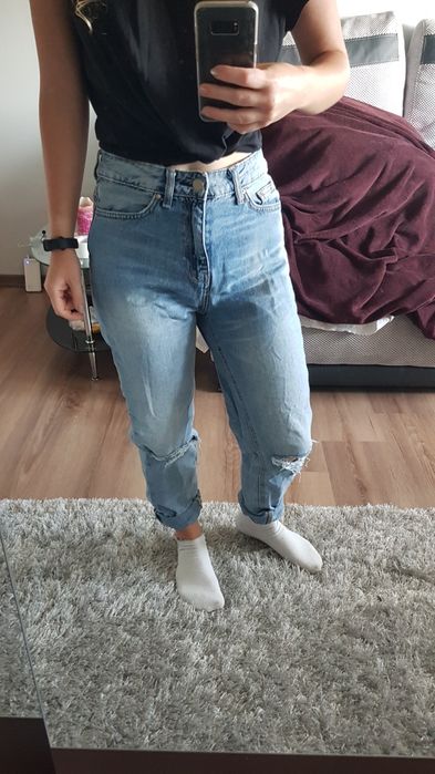 Spodnie jeans z "podarciami"