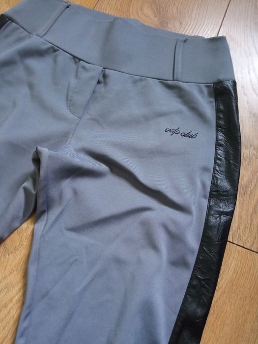 Legginsy elastyczne, lejący materiał z paskami po bokach r. M