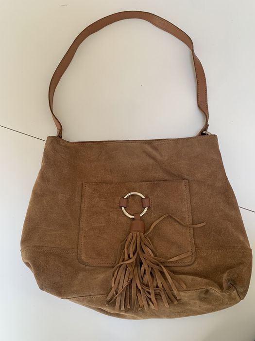 Mala em pele castanha