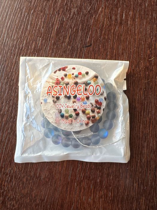 zestaw koralików do samodzielnego tworzenia biżuterii marki Asingeloo, najprawdopodobniej model z naturalnego kamienia.