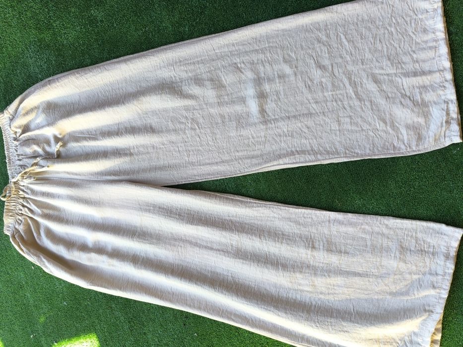 Spodnie szerokie beżowe xl włoskiej marki