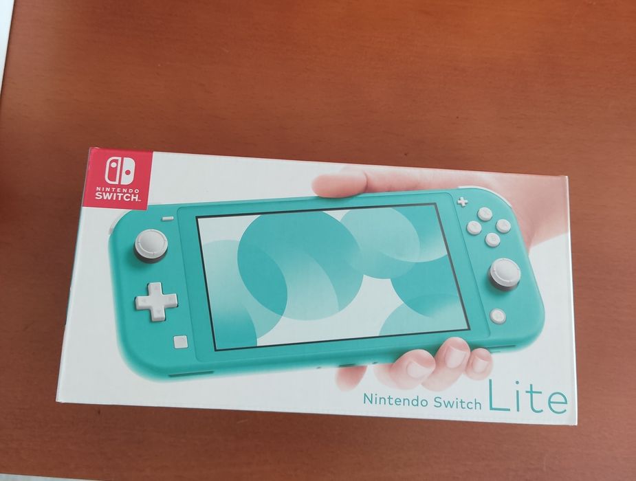 Selling Nintendo Switch Lite + 1 game of your choice!64286376724353121