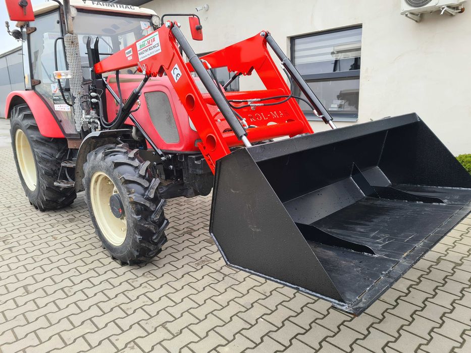 Tur, ładowacz czołowy Farmtrac 675 DT, 70 4WD. Montaż.