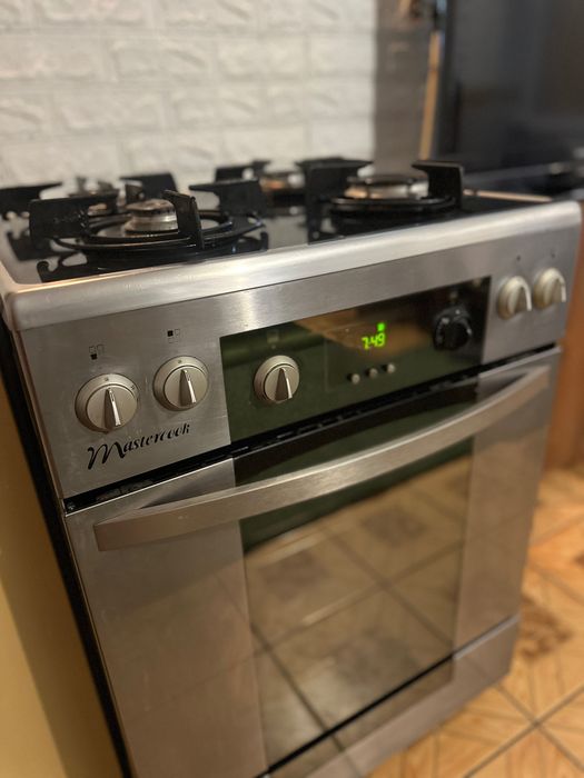 Газова плита з електричною духовкою  «Mastercook”