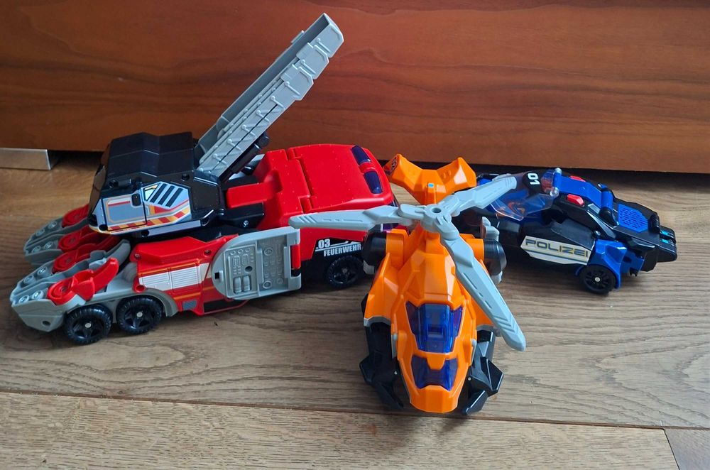 Dinozaur Transformer VTech Switch & Go Mega T-Rex 3w1 Niemiecki