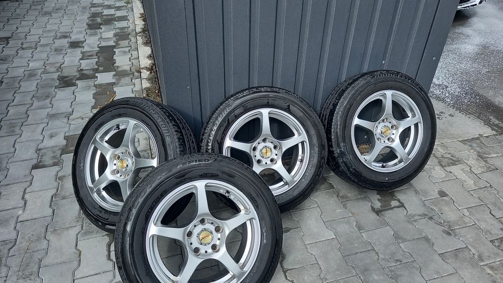 Продам резину Bdgestone летнюю с дисками 195/65/R15, 5 на 115