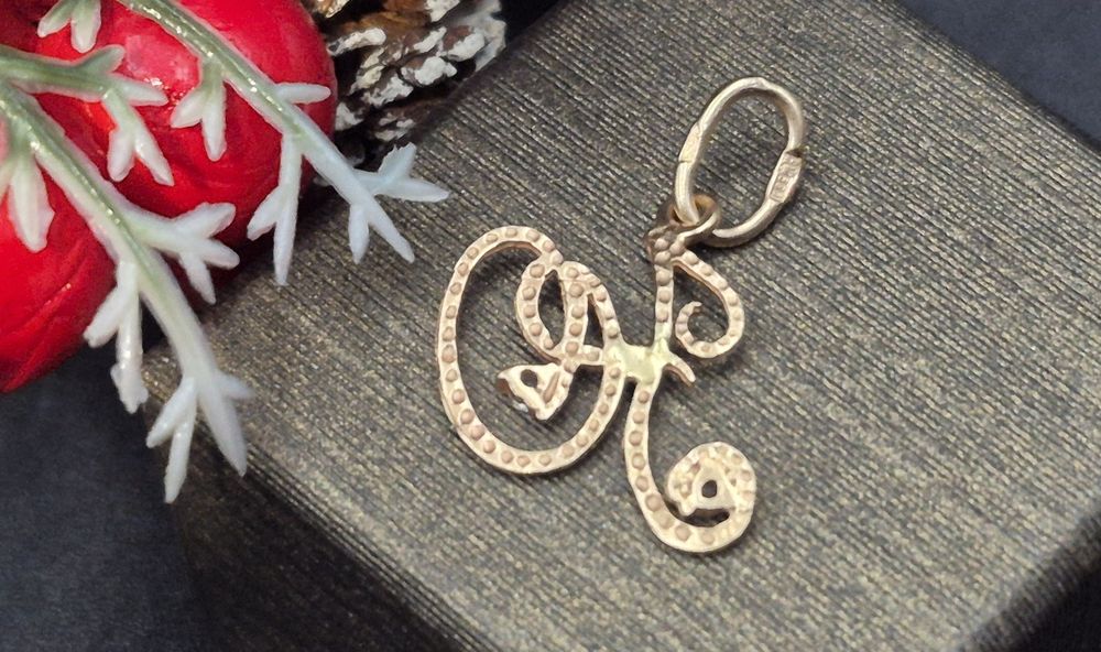 Złota zawieszka14K próby 585 literka "H" z cyrkoniami