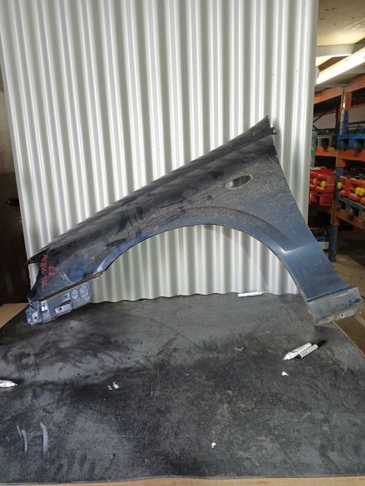 Guarda Lamas Nissan Almera MK2 ESQUERDO  Azul Escuro