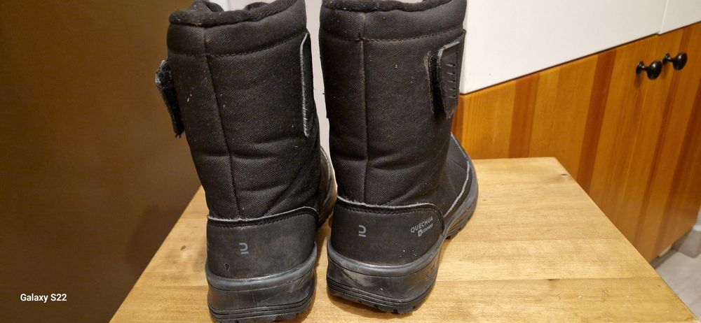 Używane Buty śniegowce czarne  Quechua.R32
Długość wkładki  20cm