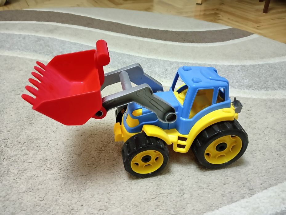 Будівельні машини: трактор і самосвал
