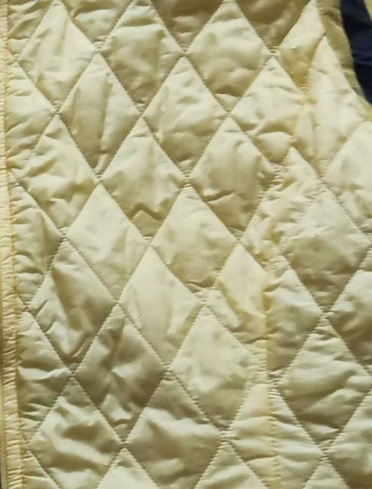 Жіноча стьогана жилетка, безрукавка великого розміру