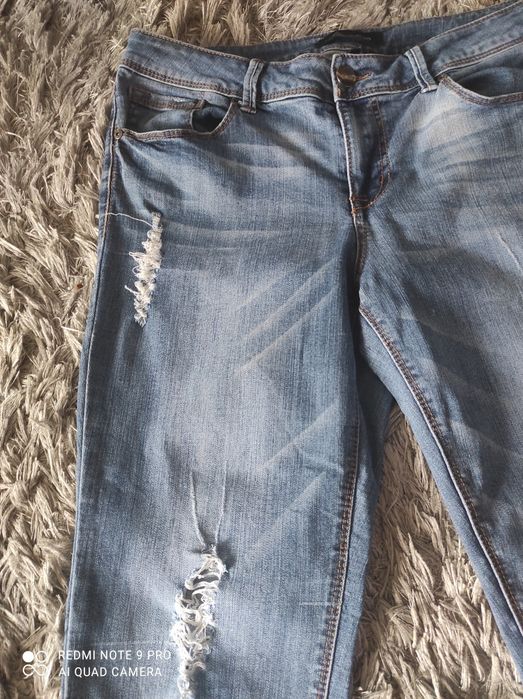 Spodnie dżinsowe " porwane"