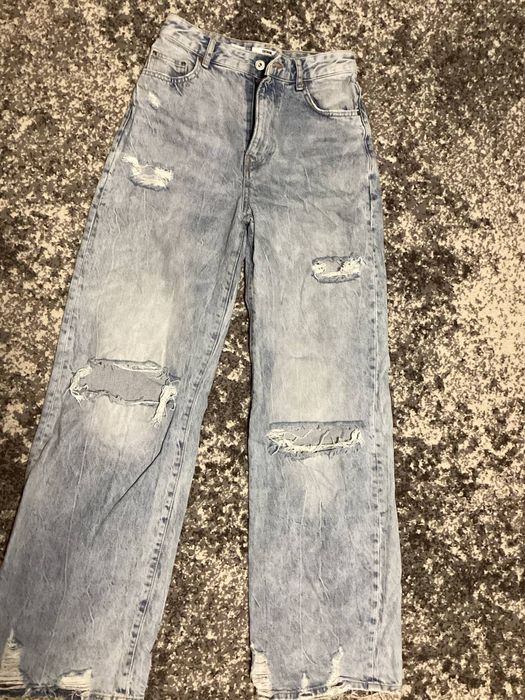 Рвані жіночі джинси