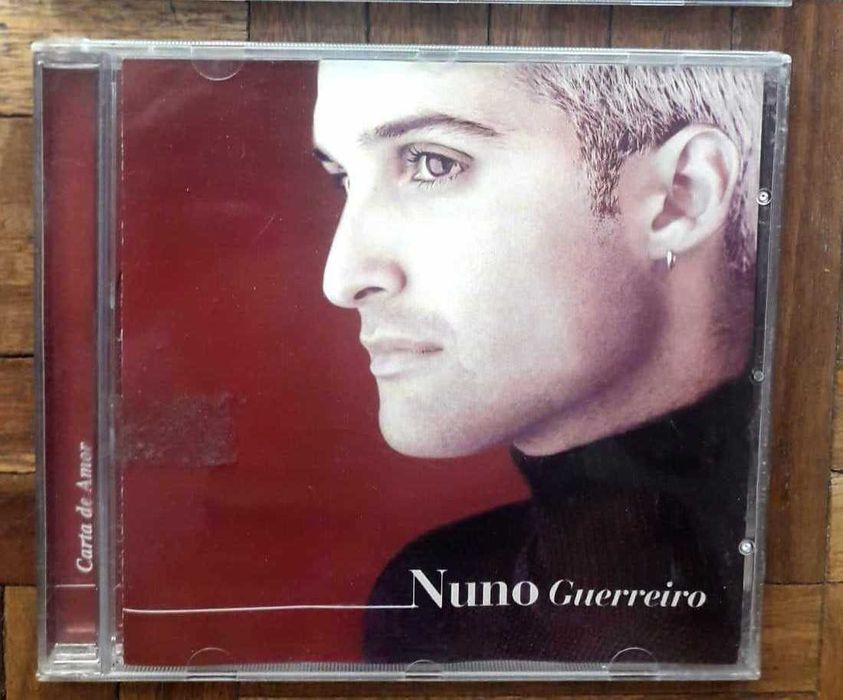 Vários CDs:  Louis Armstrong, No Doubt, Madonna, Dido, Nuno Guerreiro,  etc