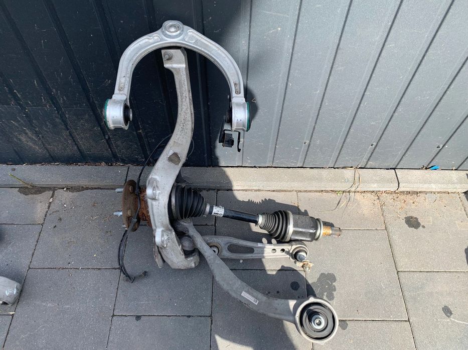 ZAWIESZENIE LEWE PRZÓD PÓŁOŚ ZWROTNICA WAHACZE LAND ROVER DEFENDER L663