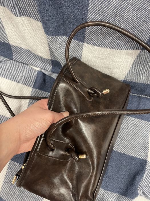 Сумка коричневого кольору