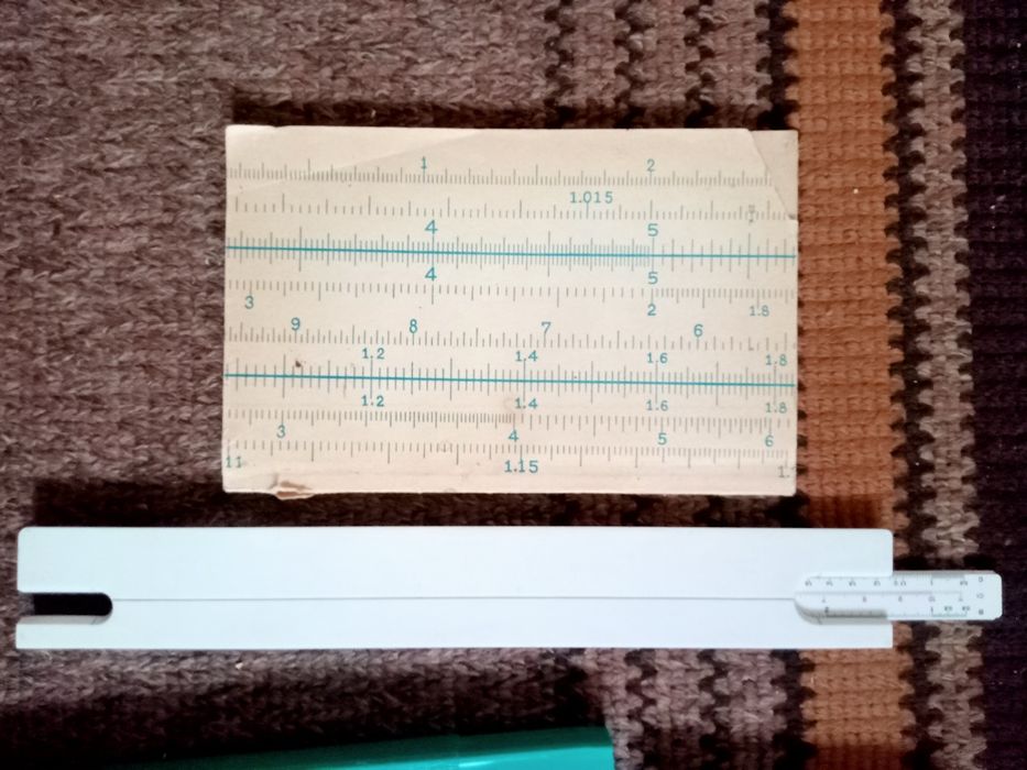 Логарифмическая линейка и книга к ней